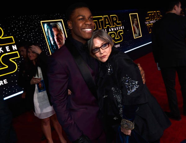 john-boyega-and-carrie-fisher star wars premiere force awakens 2015