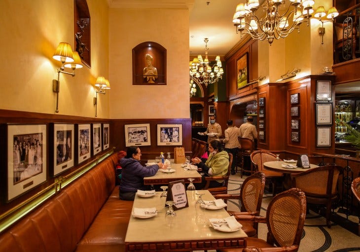 Interior of restaurant with few patrons