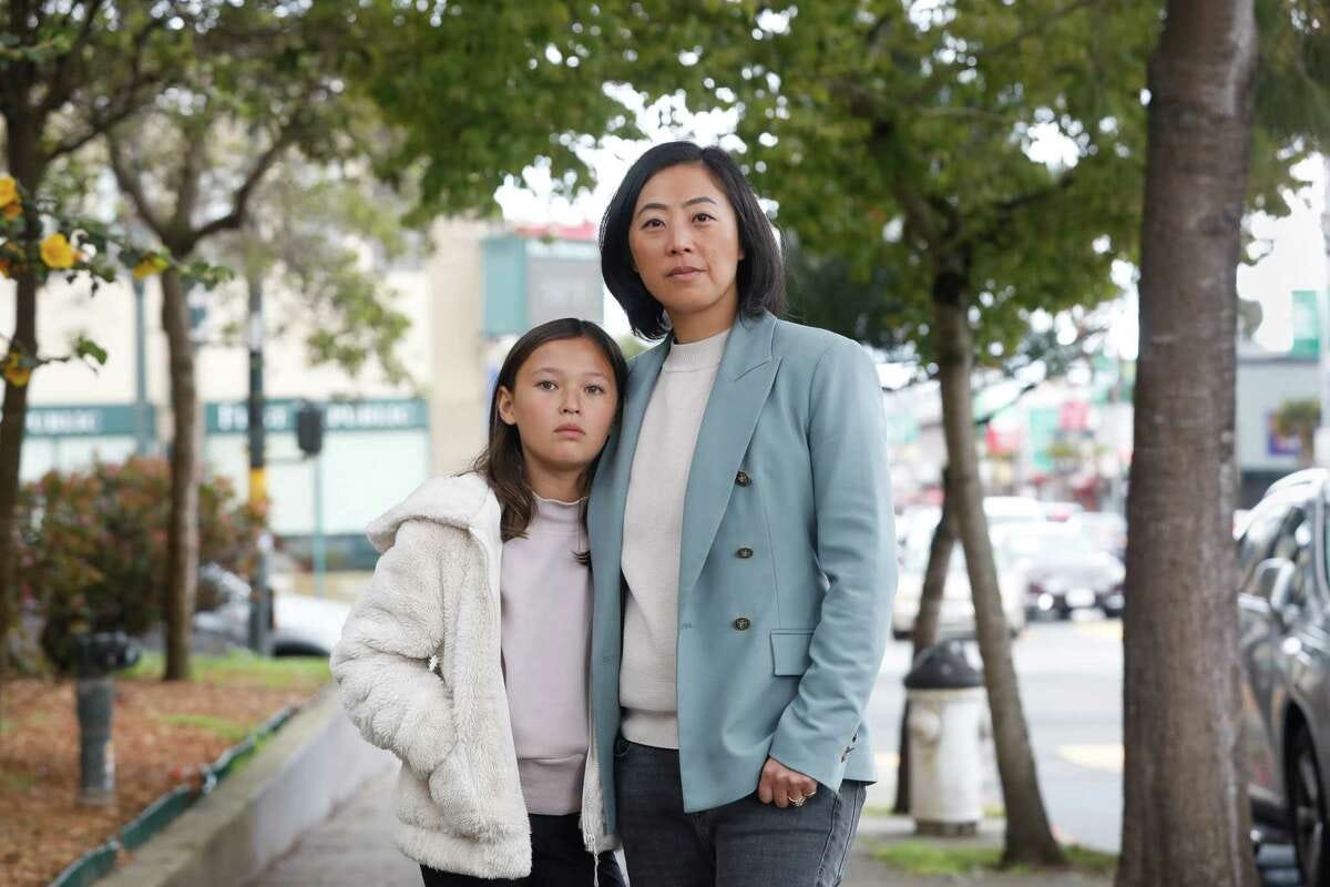 Cyn Wang, shown with daughter Sloane Wang-Larson, 9, was rebuffed in her attempt to charter her Westside Democratic Club. 