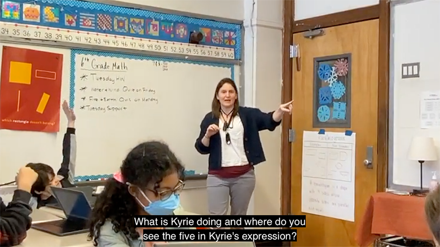 Liz pointing to a kid's work on the screen and asking "What is Kyrie doing and where do you see the five in Kyrie's expression?"