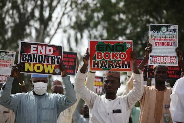 Supporters of the "Coalition of Northern Groups" (CNG) rally to urge authorities to rescue hundreds of abducted schoolboys, in northwestern state of Katsina, Nigeria on December 17, 2020. 