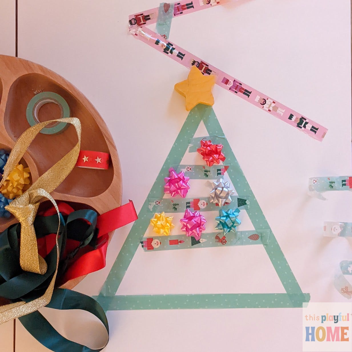 an overhead photograph of a Christmas tree made from washi tape 