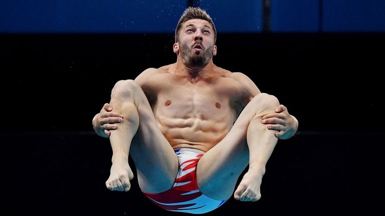 French diver Alexis Jandard slips during Olympic inauguration performance  in front of Emmanuel Macron | World News | Sky News