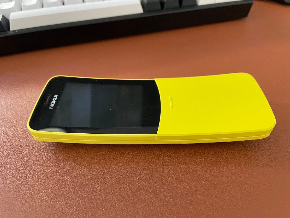 Photo of a Nokia 8810 in yellow lying back down