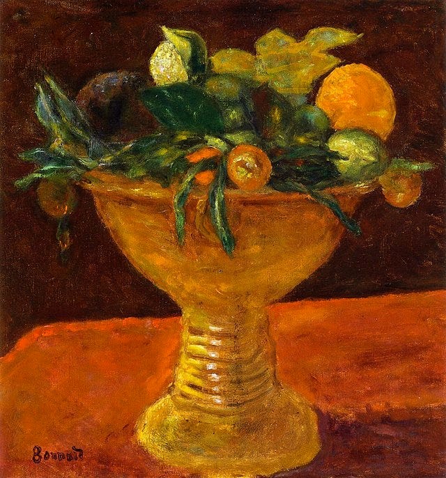 bowl of fruit in vase