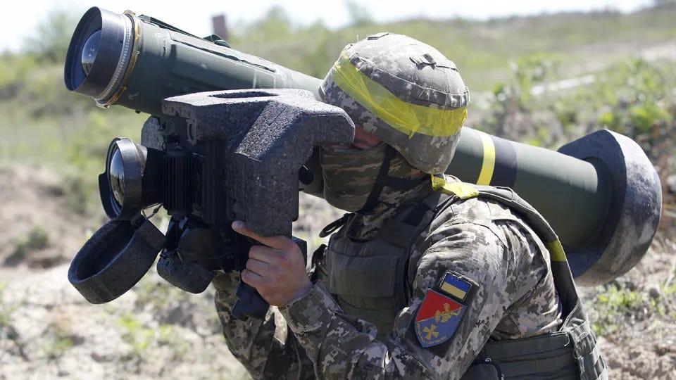 A Ukrainian serviceman holds an American-made antitank guided missile during a training exercise. 