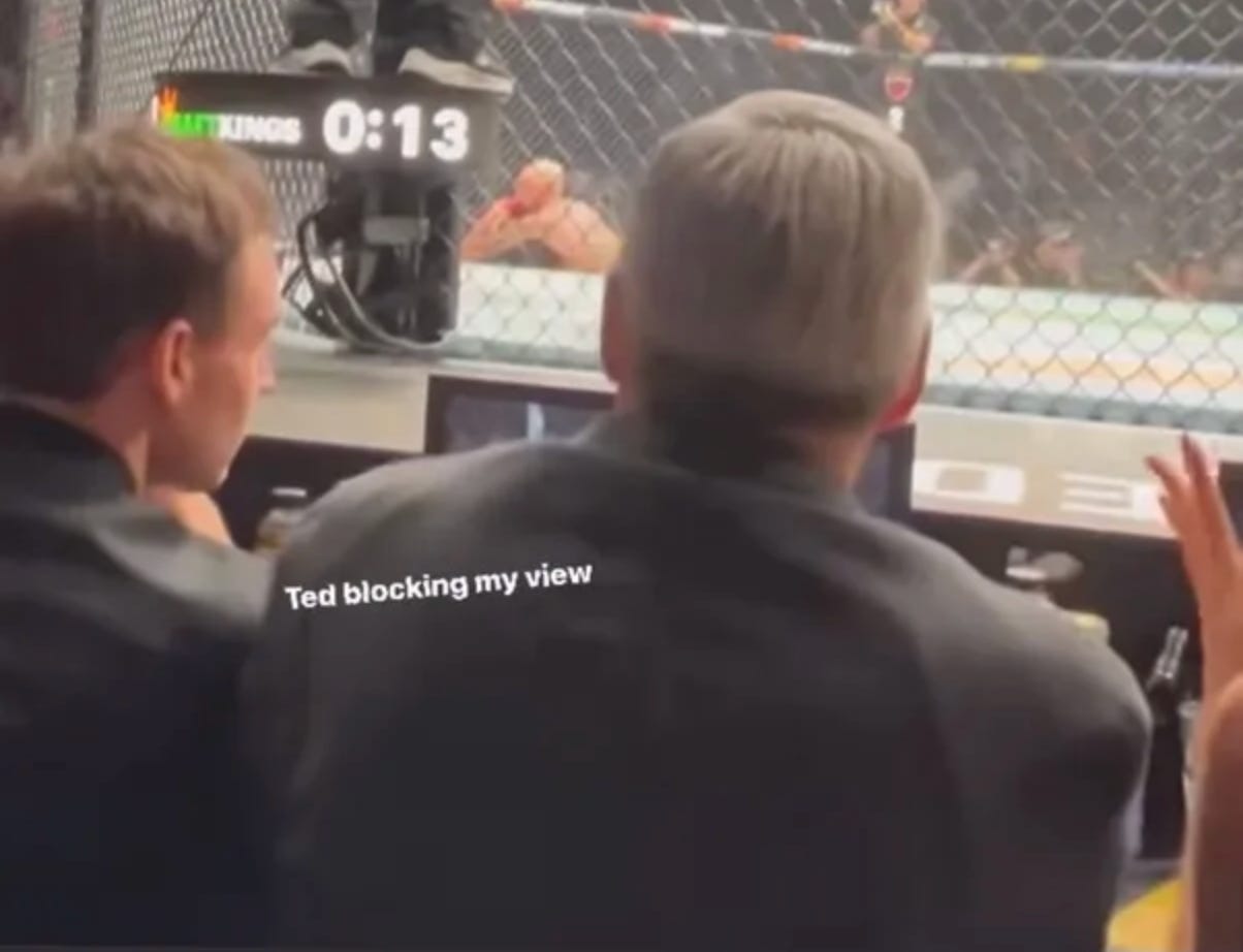 David Spade posted a photo of UFC owner Ari Emanuel and Netflix Co-CEO Ted Sarandos sitting cage side at UFC 300