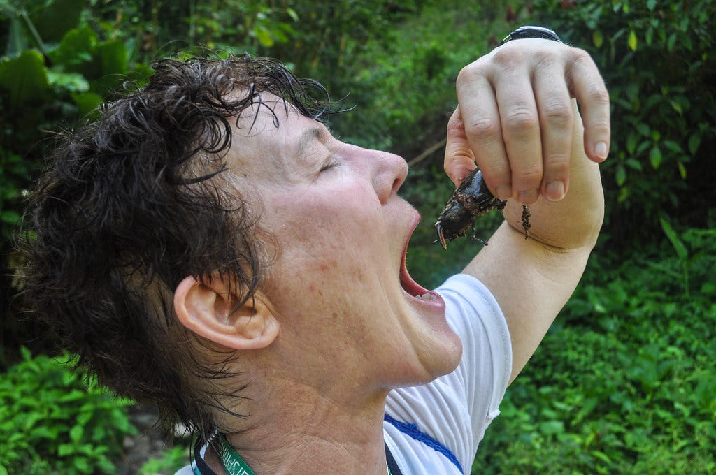 Mrs. Howison eating a bug!