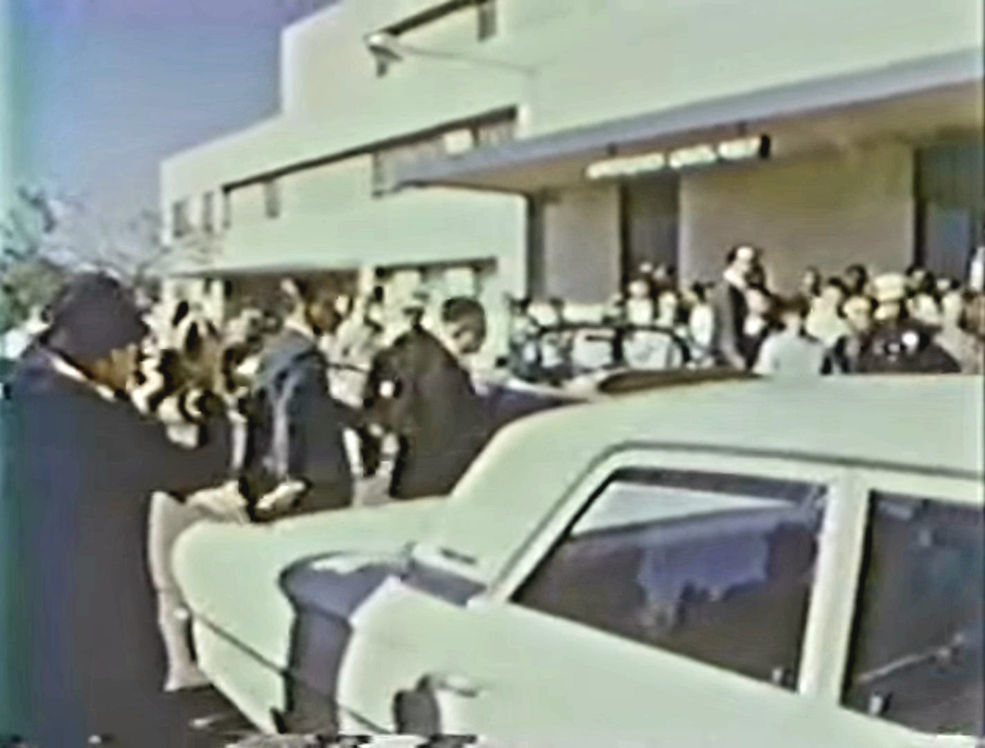 Frame from Thomas M. Atkins film of Dr. Burkley arriving at Parkland Hospital