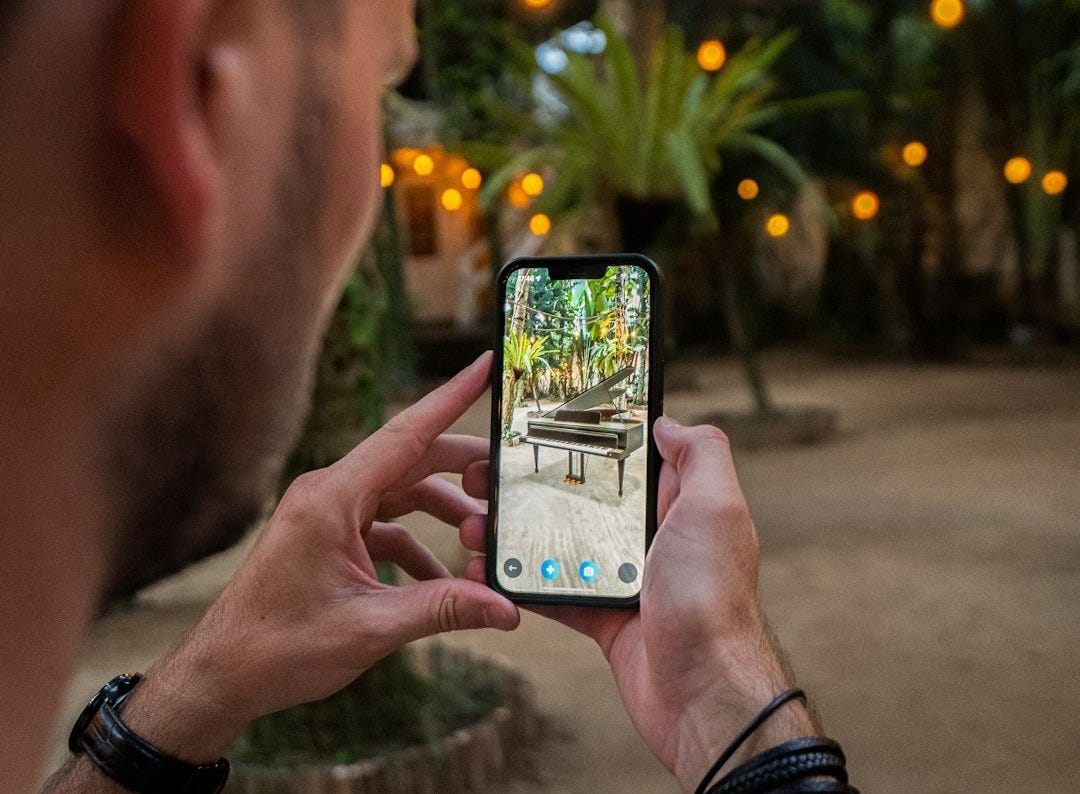 a man holding a cell phone