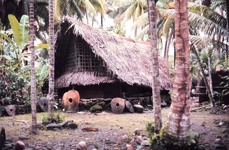File:Community house of Yorlap (Yap Islands) with stone money made in Palau NOAA.jpg