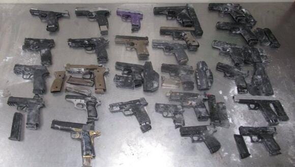 Guns & ammunition clips bound for a Mexican Cartel seized in Texas