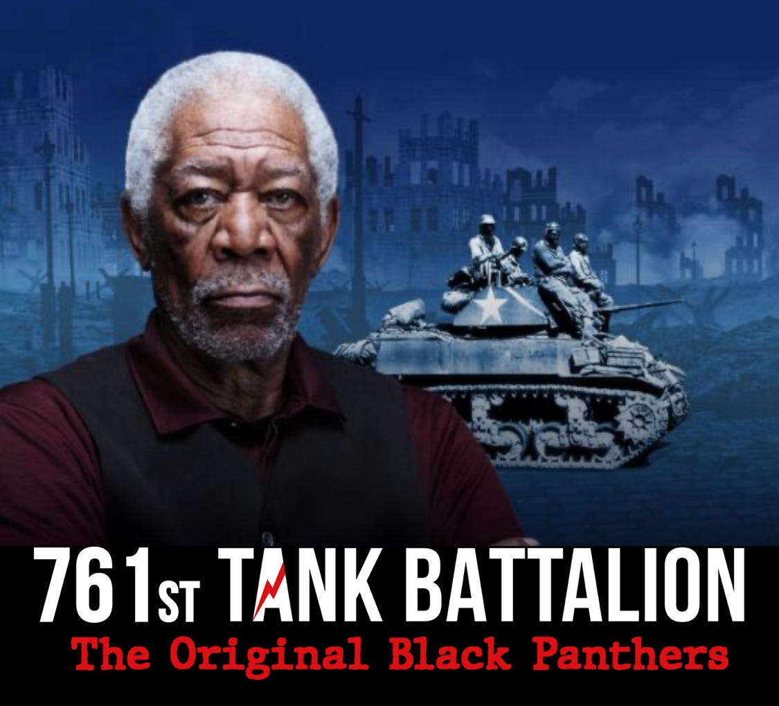 Morgan Freeman alongside a poster for his film "761st Tank Battalion"