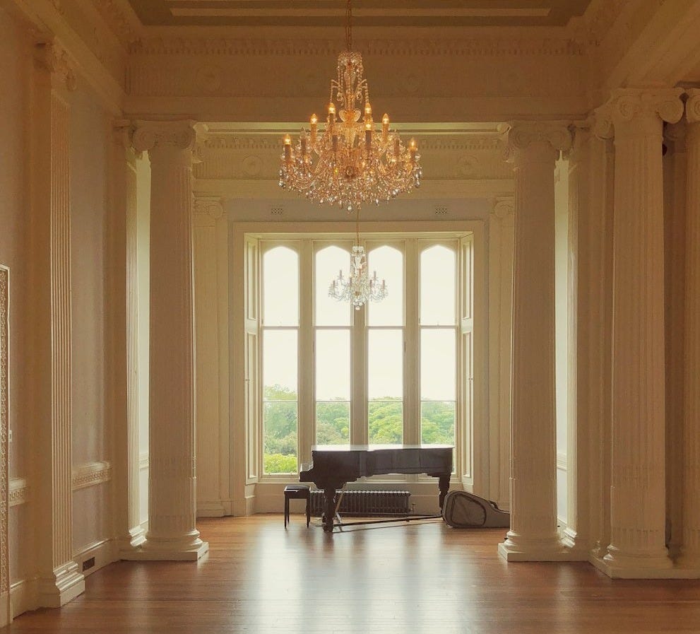 gold chandelier in room