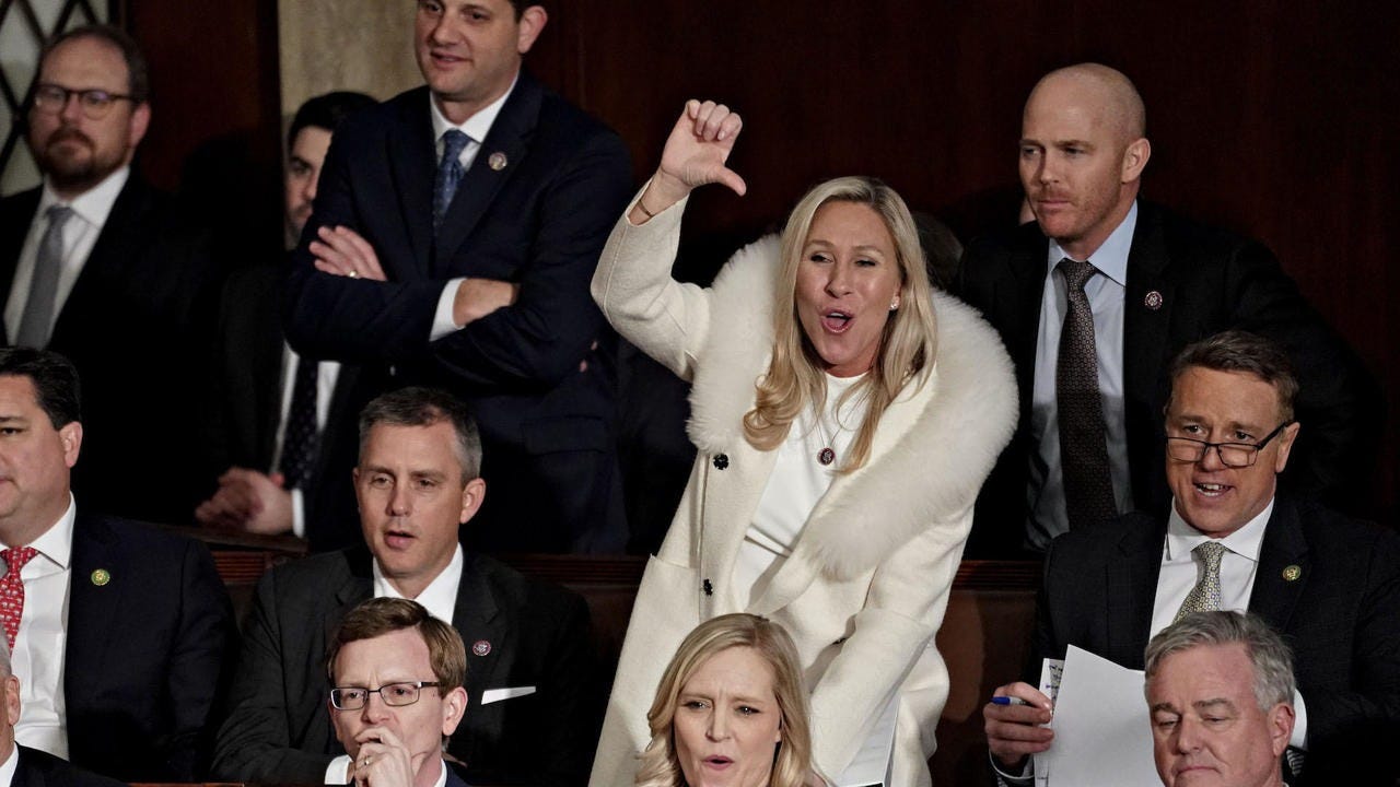 Marjorie Taylor Greene shouts "liar" at Biden during State of the Union  address - CBS News