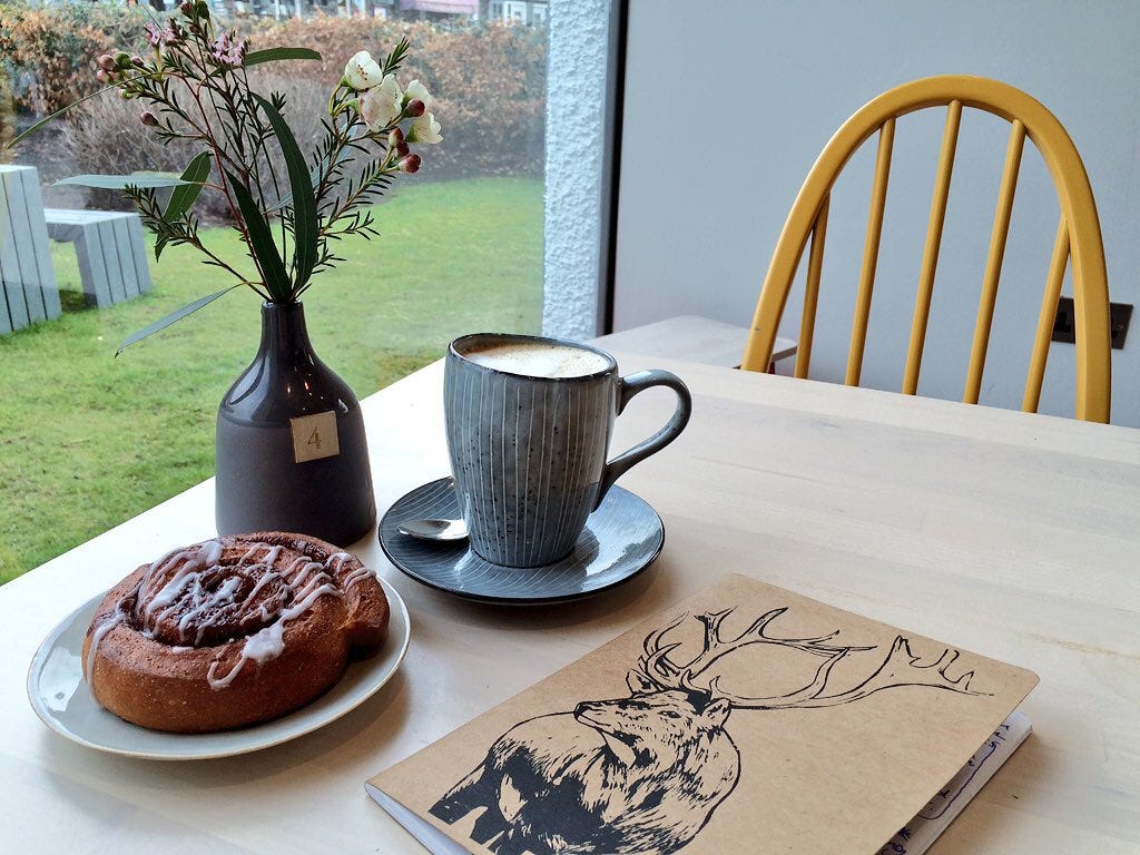 Writing poetry in a cafe in Grasmere