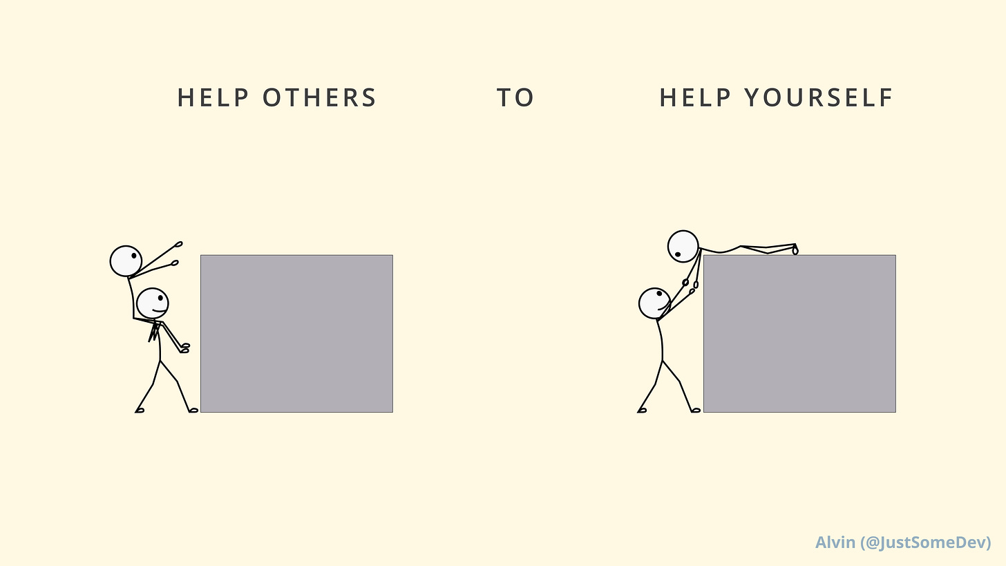 A person gets on the shoulders of another to reach the top of a ledge and climbs on top. Then, reaches down to lift the other person up on top of the ledge. Help others to help yourself.