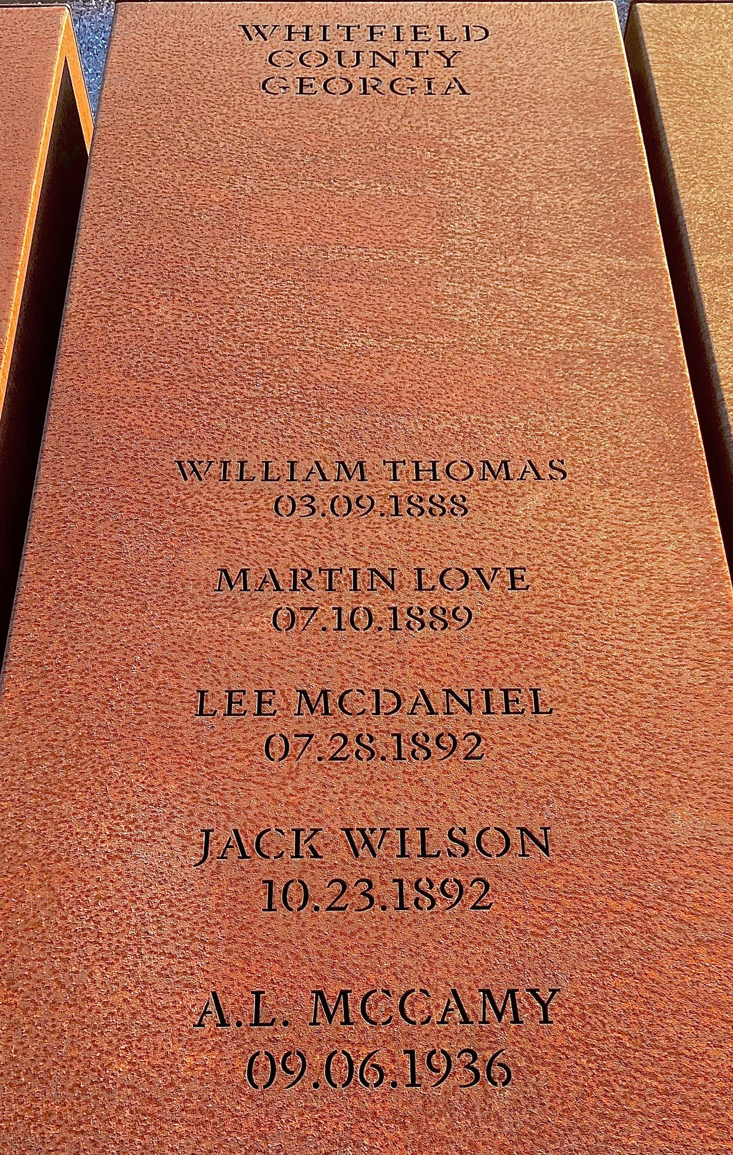 The five lynching victims in Whitfield County, Georgia, where I grew up, listed on a steel block at the National Memorial for Peace and Justice.