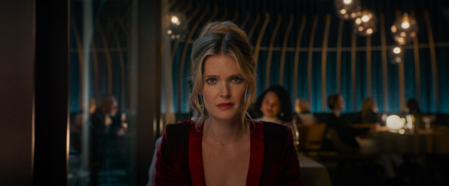 Meghann Fahy as Violet in Drop