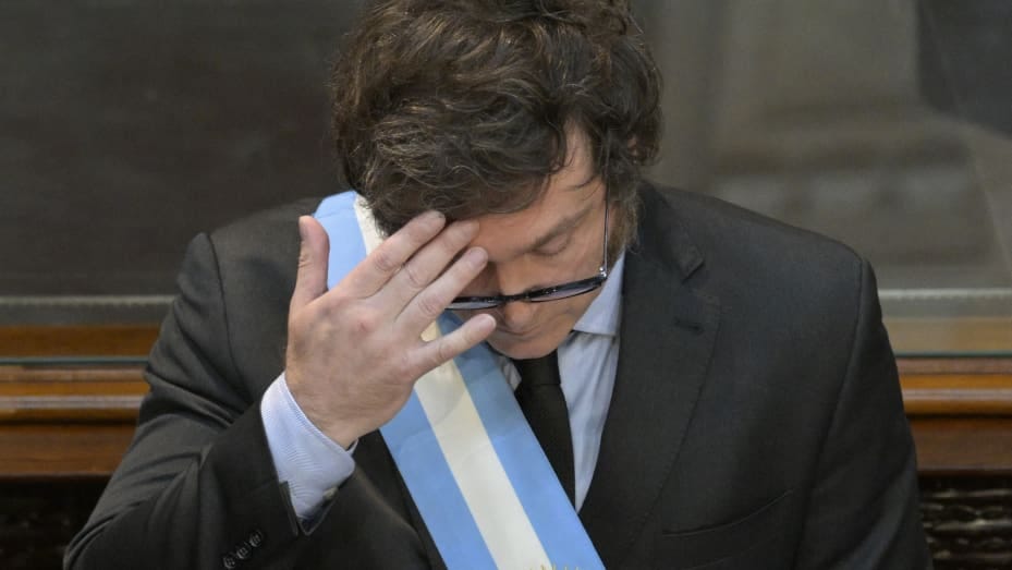 Argentina's President Javier Milei gestures while delivering his first policy speech to parliament during the inauguration of the 142nd ordinary session of Congress in Buenos Aires on March 1, 2024. Argentina's self-styled anarcho-capitalist President Javier Milei made his first policy speech to parliament on Friday, facing lawmakers he has described as "rats" and "traitors" for stalling his project of deregulation and budget cuts. (Photo by JUAN MABROMATA / AFP) (Photo by JUAN MABROMATA/AFP via Getty Image