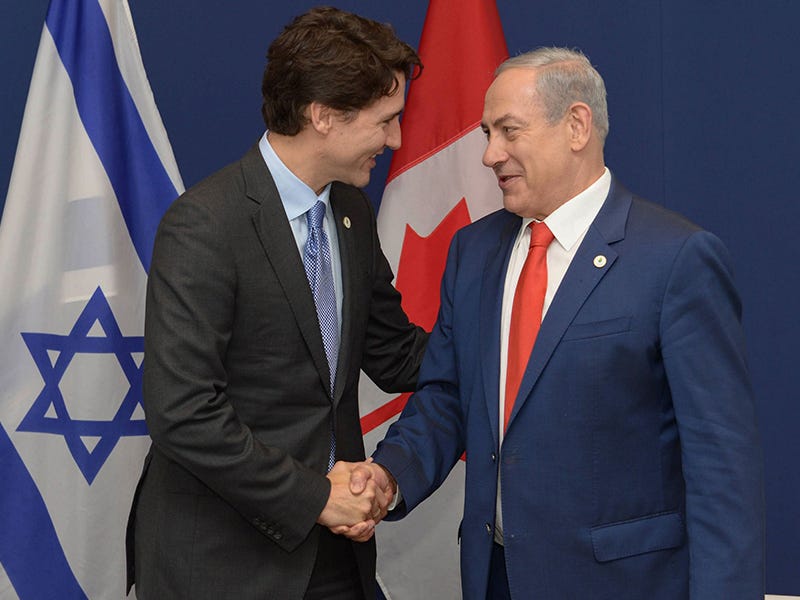 Prime Minister Justin Trudeau, left, with Israeli Prime Minister Benjamin Netanyahu in Paris AMOS BEN GERSHOM/GPO PHOTO