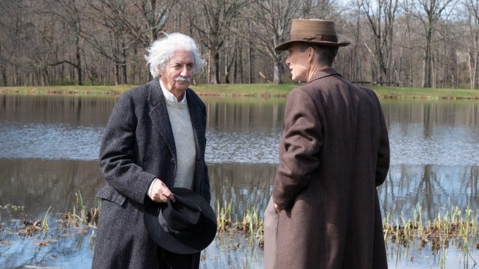 L to R: Tom Conti is Albert Einstein and Cillian Murphy is J. Robert Oppenheimer in 'Oppenheimer'