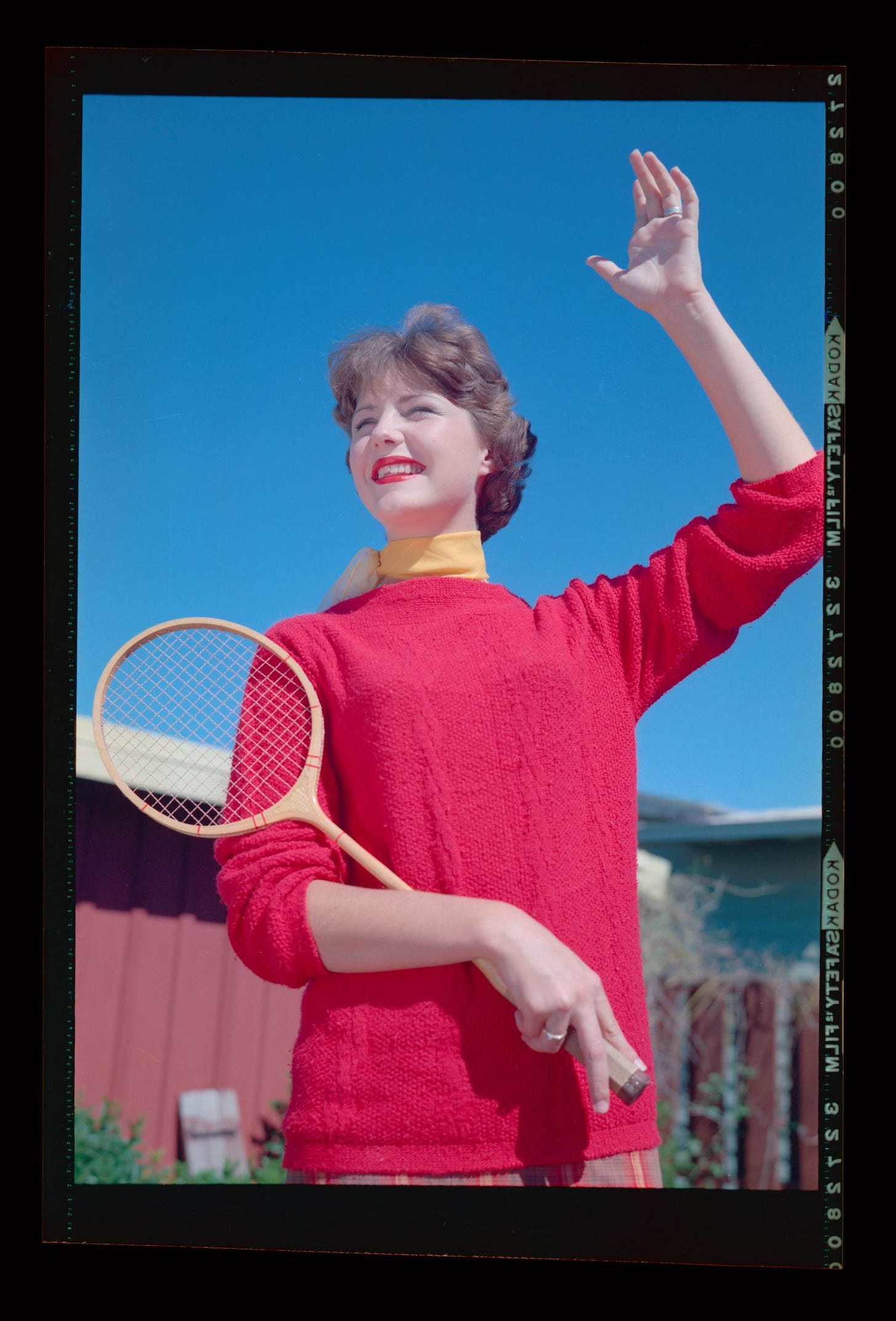 large representation of [Carol with a Tennis Racquet]. Side 1 of 1
