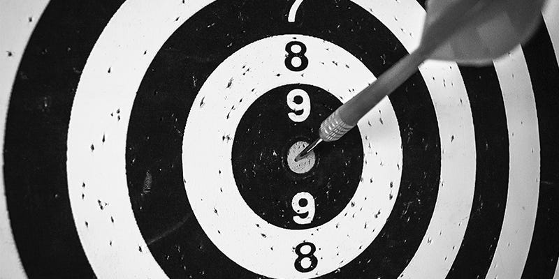 Target with dart in the bullseye