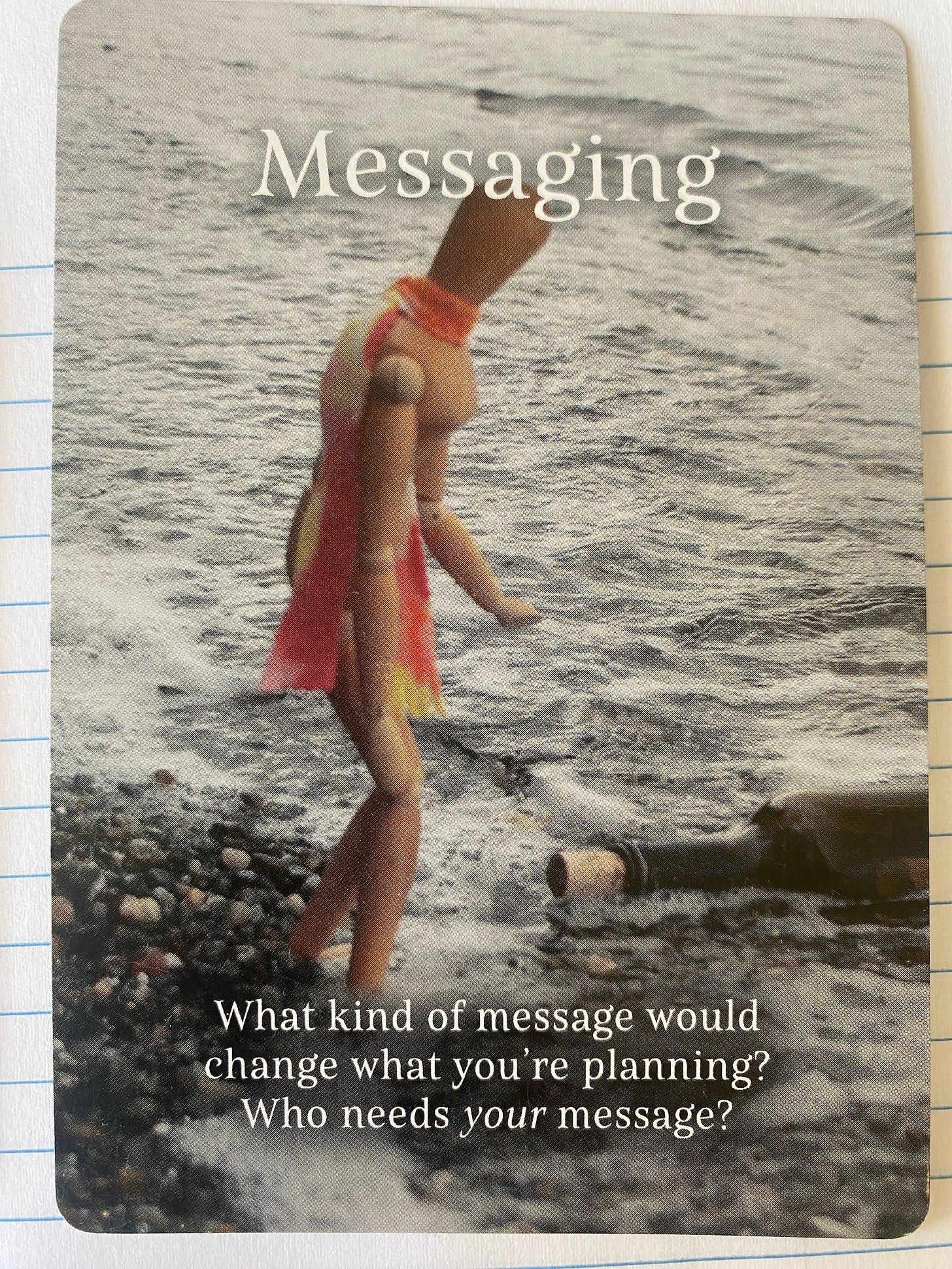 Supposing card with the Emotikin art manikin (inner artist) finding a bottle in the ocean. The card is titled Messaging and the caption reads “What kind of message would change what you’re planning? Who needs your message?”