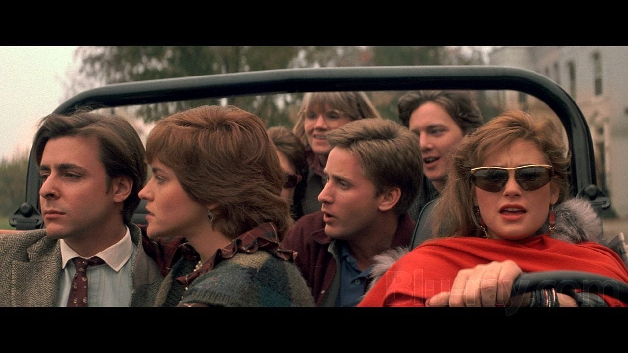 Scene from "St. Elmo's Fire" with cast riding in jeep