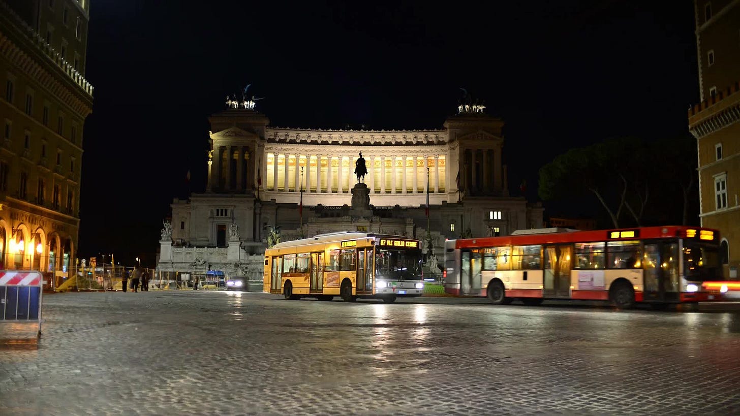 Rome Italy night traffic on Piazza Venezia timelapse