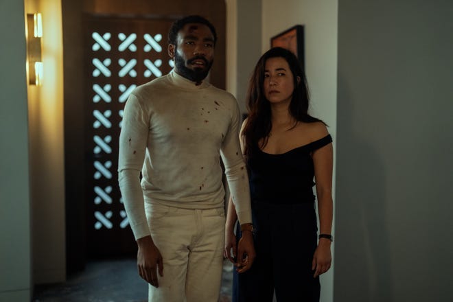 Donald Glover and Maya Erskine play two spies stuck together in a fake marriage that turns really romantic in "Mr. and Mrs. Smith."