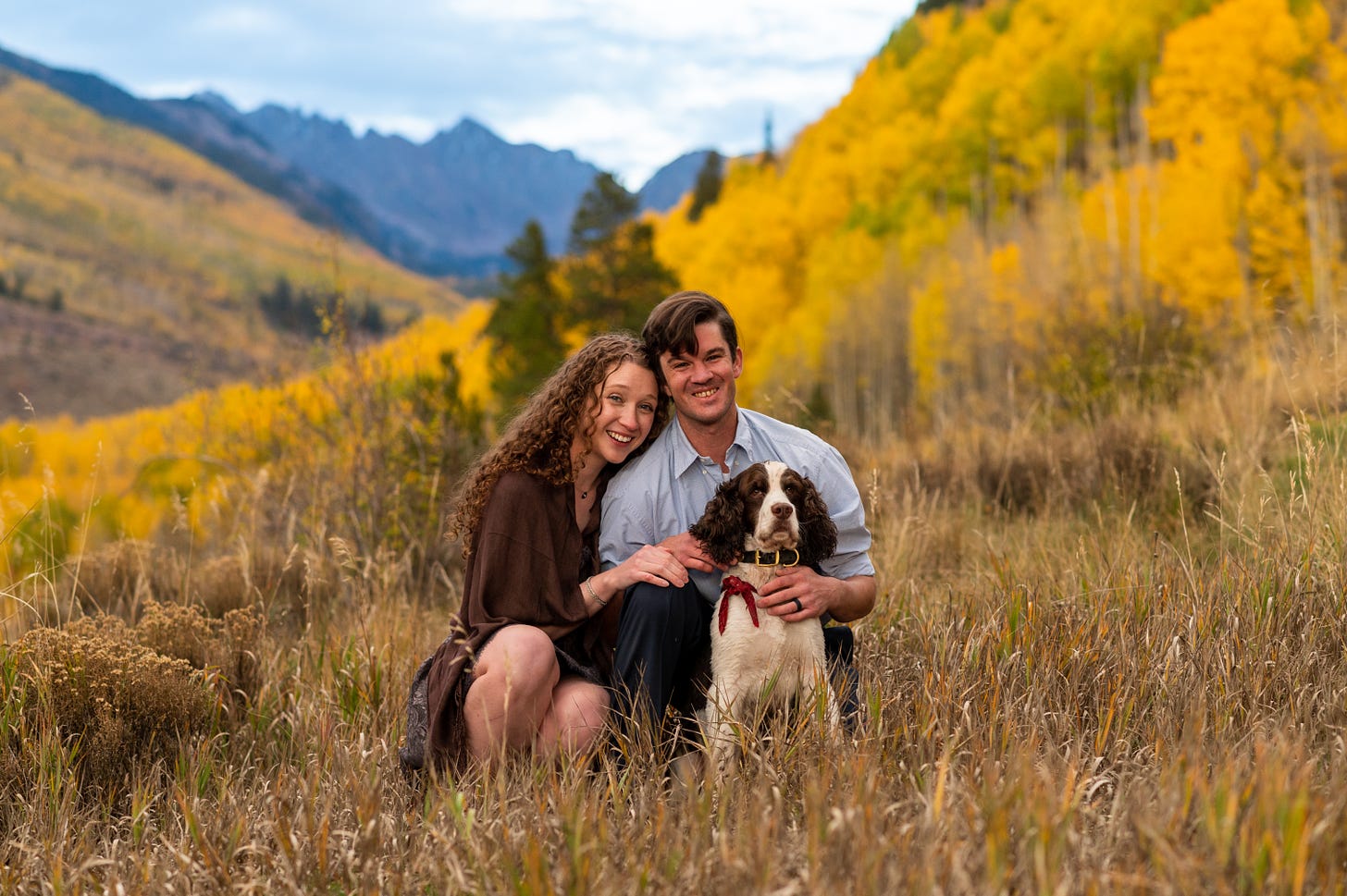 Family portrait set in the rocky mountains