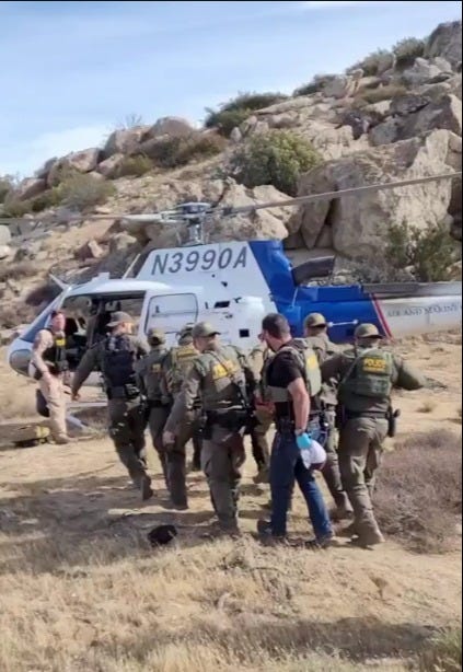 US Hiker shot by Mexican cartel Smugglers on US soil is loaded aboard a helicopter for transportation to a hospital for emergency treatment