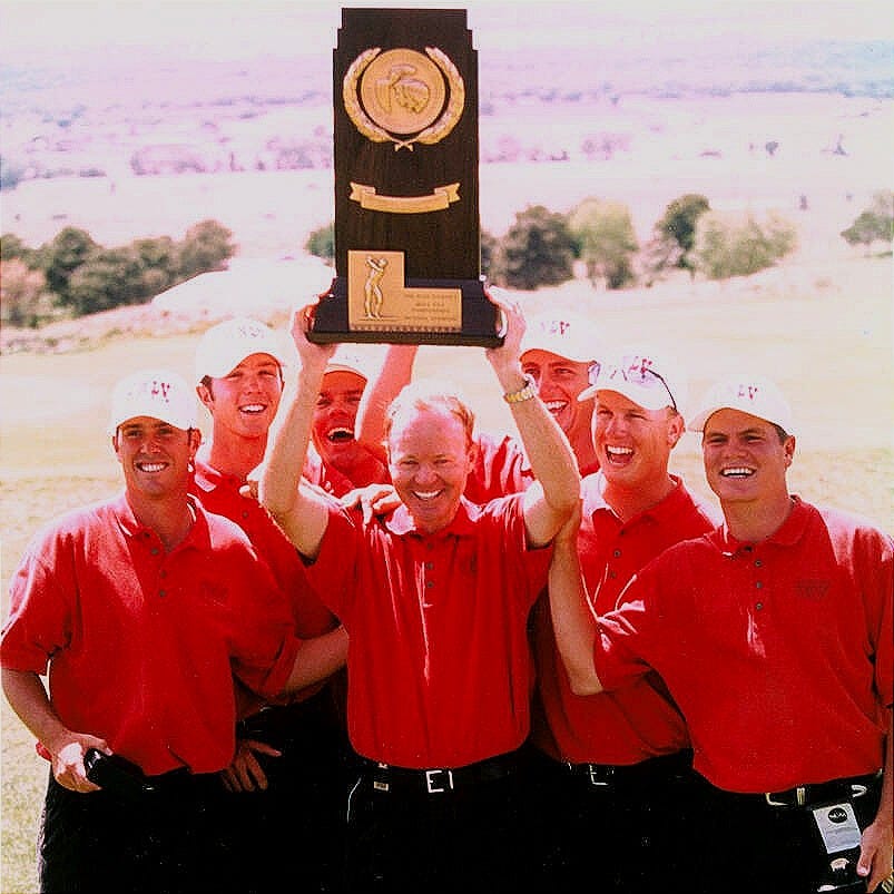 Members of the 1998 UNLV men's golf team with the NCAA championship trophy, from left, Chris Be ...