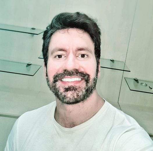 May be an image of 1 person, beard and smiling