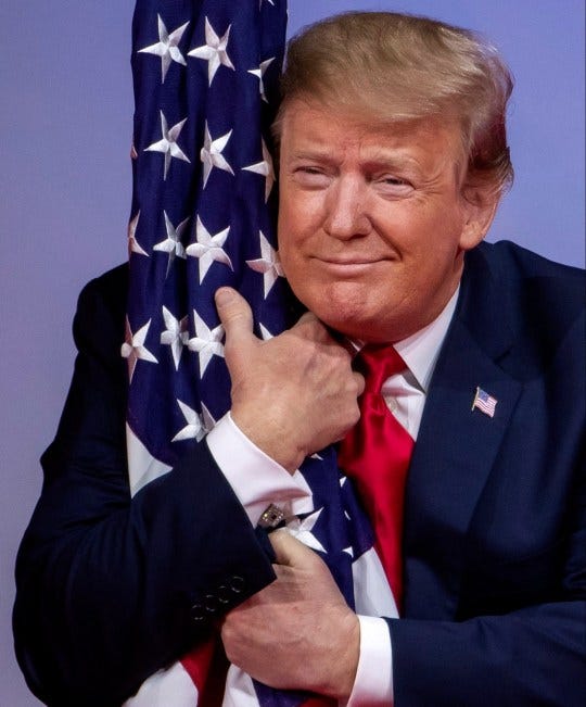 President Trump hugs the American flag and we have no idea why | Metro News