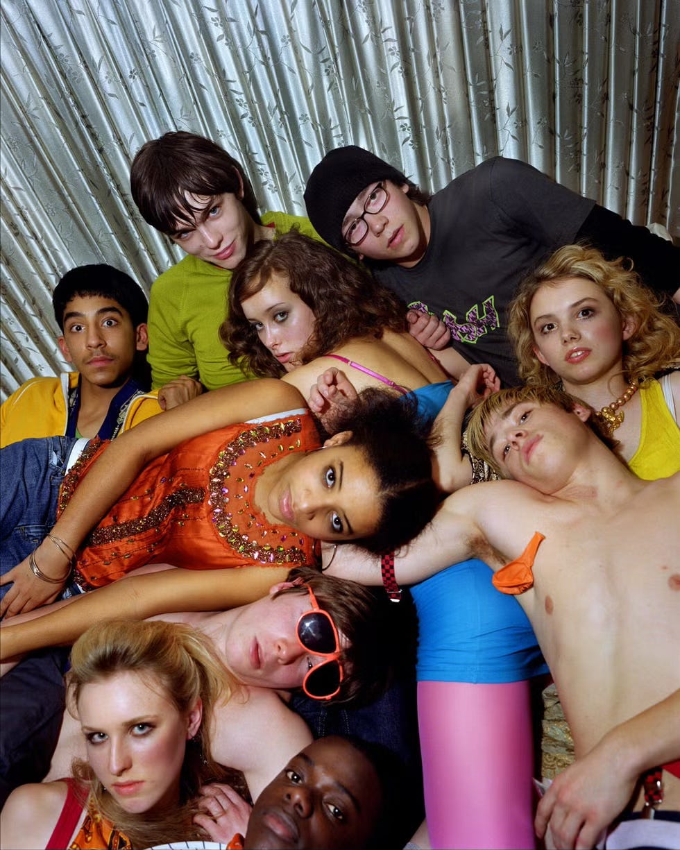 The cast of the first series of skins which includes Nicholas Hoult, Dev Patel and Daniel Kaluuya. There is a group of 10 teenagers lying all over each other dressed in the sort of gear you would wear at a festival if you were 19 in 2007. They look kind of hammered but are all TV-ready. The cast of the first series of skins which includes Nicholas Hoult, Dev Patel and Daniel Kaluuya. There is a group of 10 teenagers lying all over each other dressed in the sort of gear you would wear at a festival if you were 19 in 2007. They look kind of hammered but are all TV-ready.