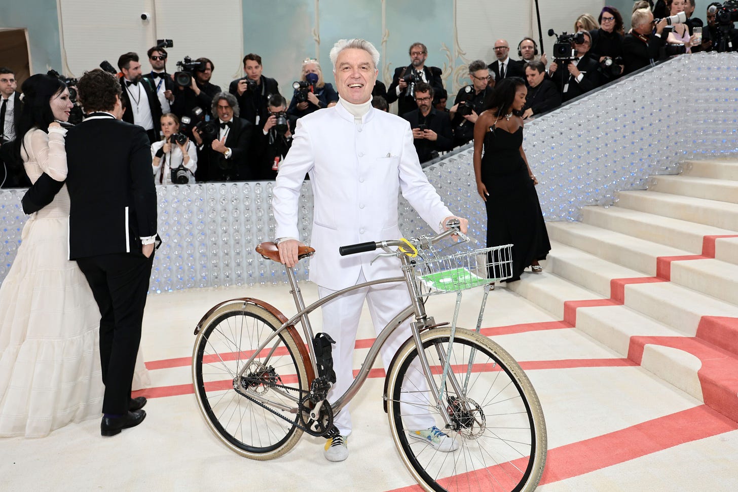 David Byrne Arrives to the Met Gala on a Bike