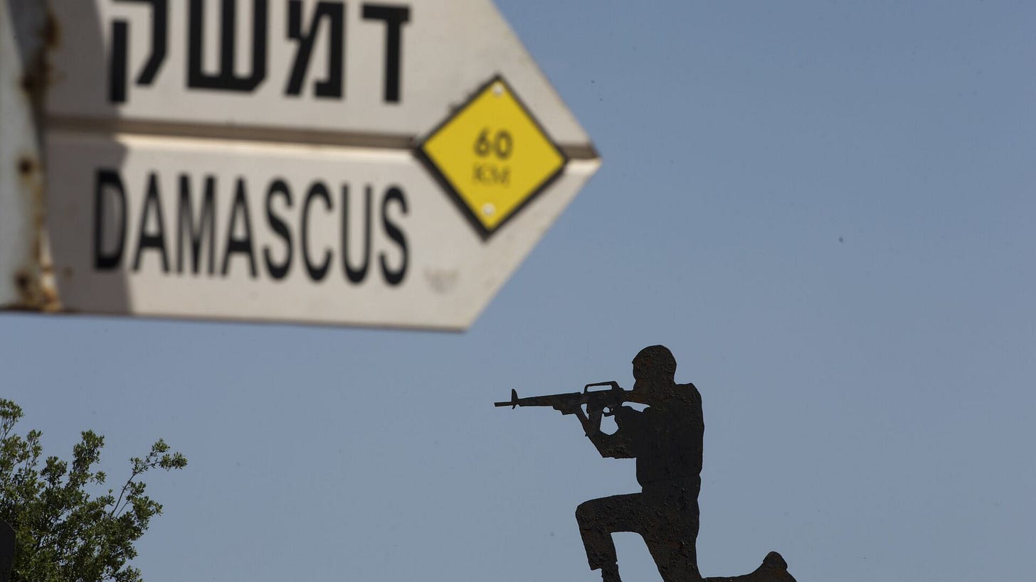 A mock road sign for Damascus, the capital of Syria, and a cutout of a soldier, are displayed in an old outpost in the Israeli controlled Golan Heights near the border with Syria, Thursday, May 10, 2018 - Sputnik International, 1920, 10.12.2024