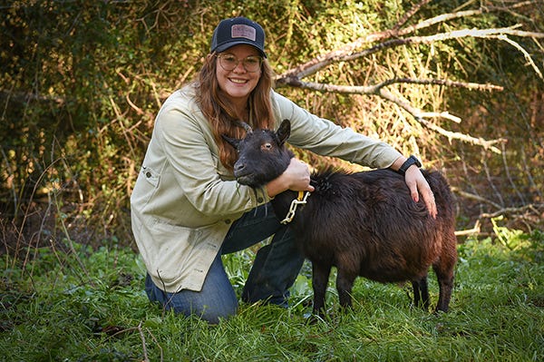 Mia Scott with her Number One Goat that helped start Mt. Moriah Farms that specializes in goat products. (TROY photo/Clif Lusk)