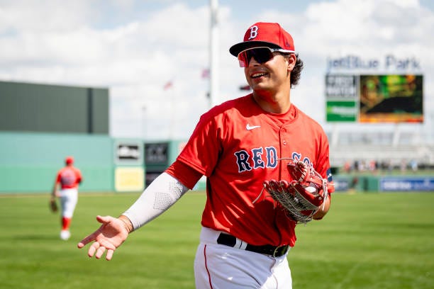 Nick Yorke of the Boston Red Sox reacts as he warms up before a game against the Northeastern Huskies at JetBlue Park at Fenway South on February 23,...