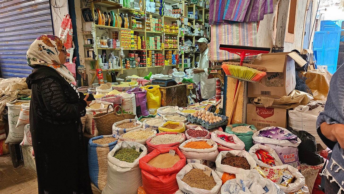 Latifa buying couscous and spices for our meal