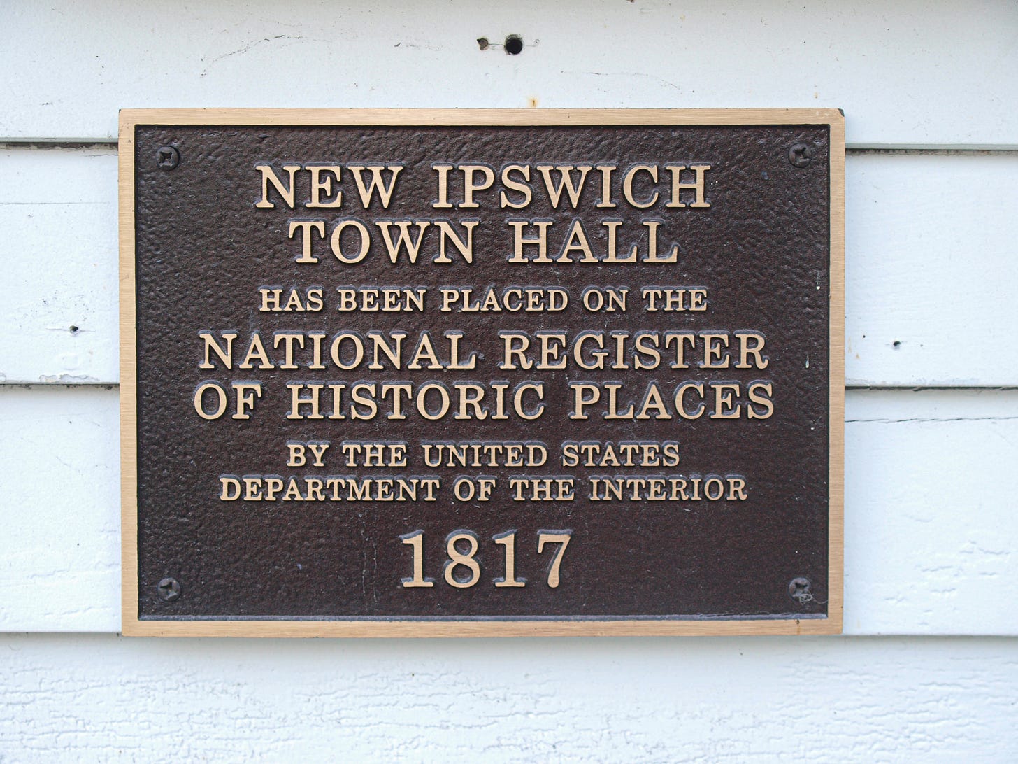 Bronze marker for NI town hall