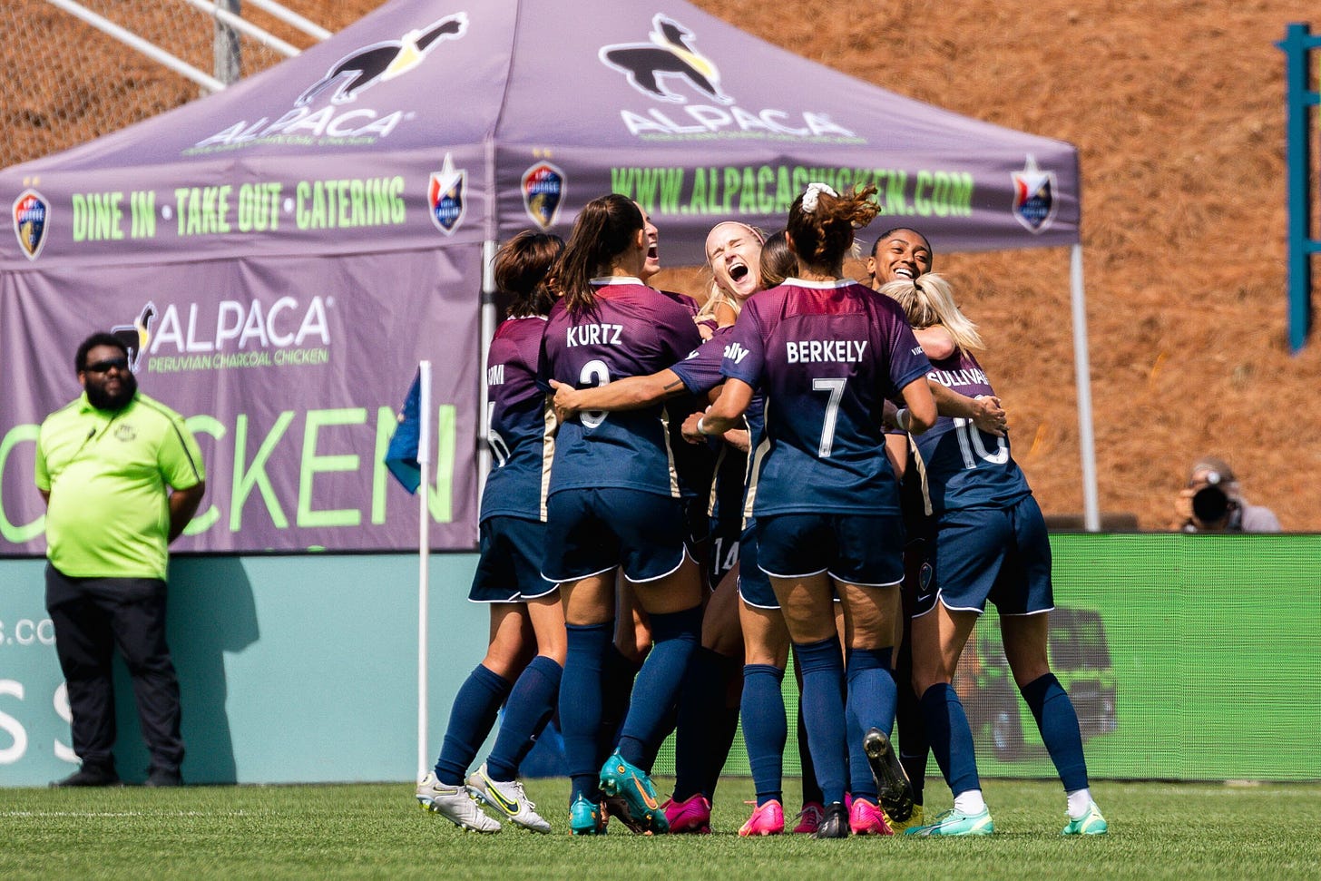 North Carolina Courage players celebrate Tyler Lussi's goal during a Sunday afternoon game in Cary, North Carolina