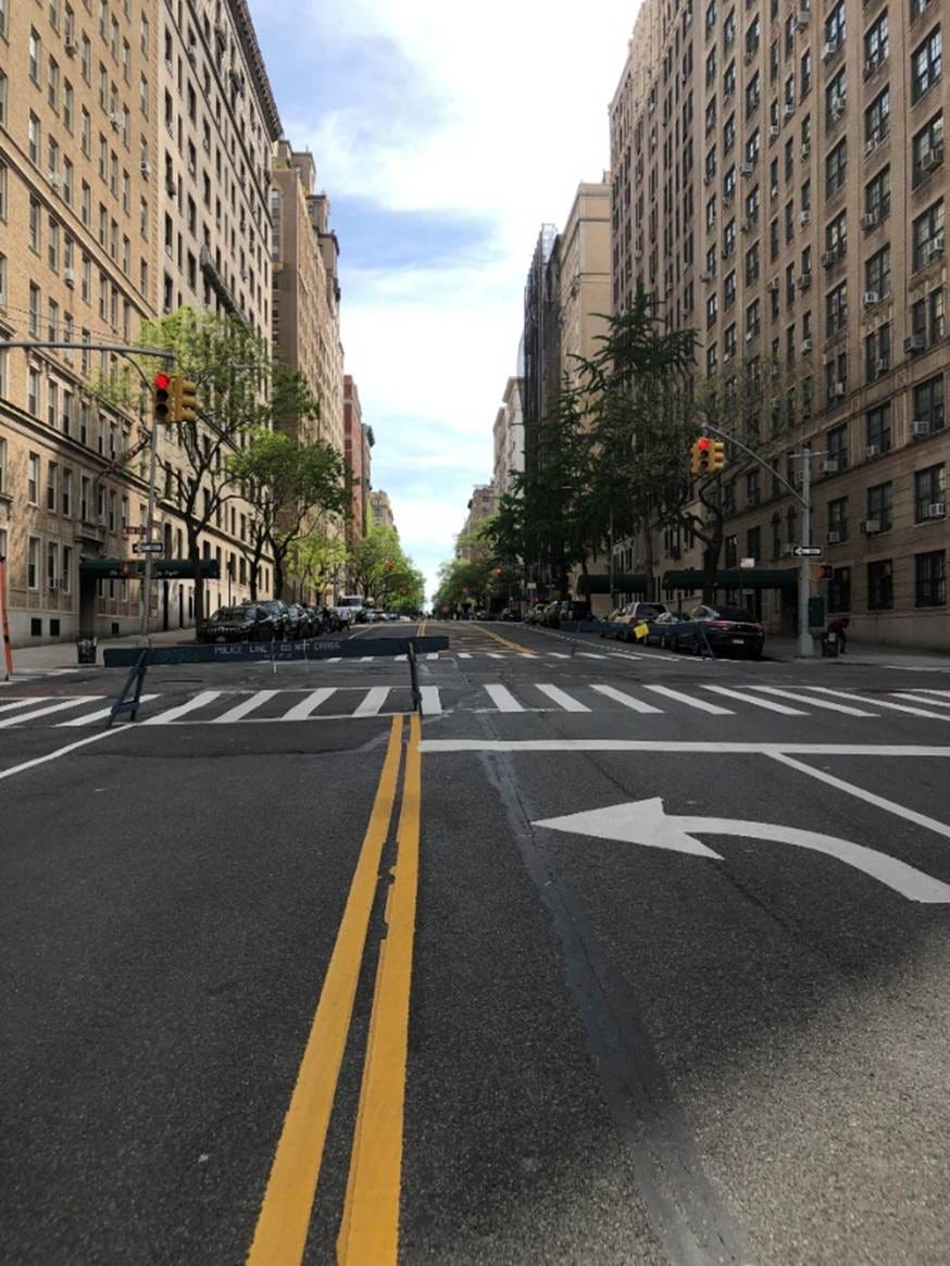 A street with buildings in the background

AI-generated content may be incorrect.