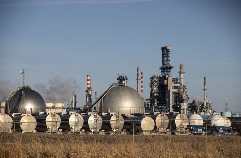 Storage tanks and trucks at the Imperial refinery in Edmonton, Alberta, Canada..