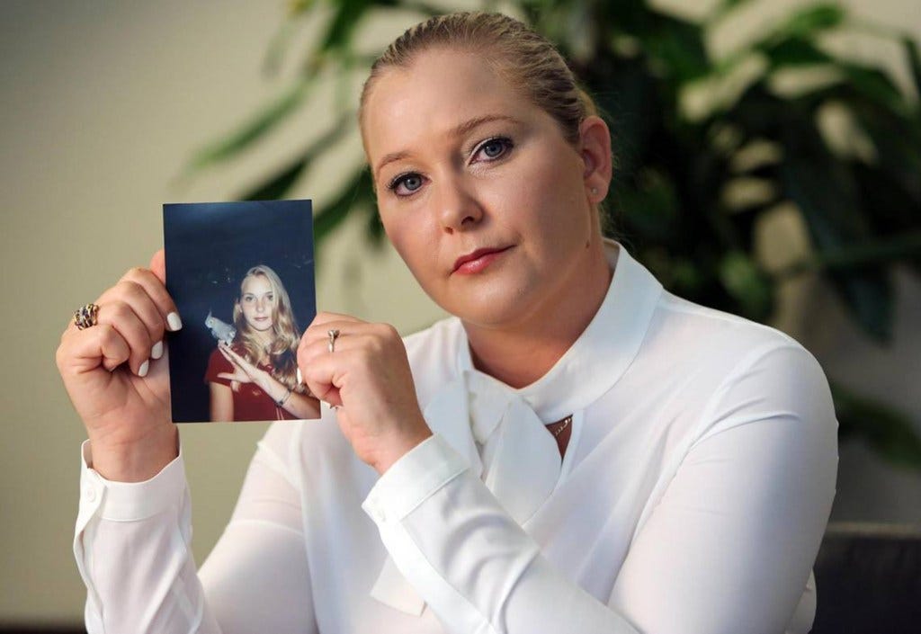 Virginia Roberts Giuffre holds a photo of herself as a teen, when she says she was abused by Jeffrey Epstein, Ghislaine Maxwell and Prince Andrew, among others.