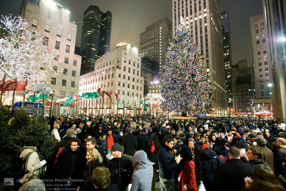 Crowds viewing the Rockefeller Center Christmas Tree | Jim M. Goldstein  Photography