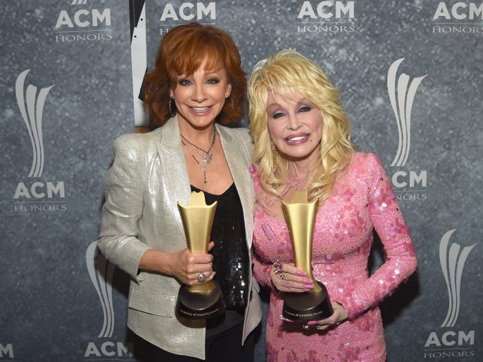 Honorees Reba McEntire and Dolly Parton attend the 11th Annual ACM Honors at the Ryman Auditorium on August 23, 2017.